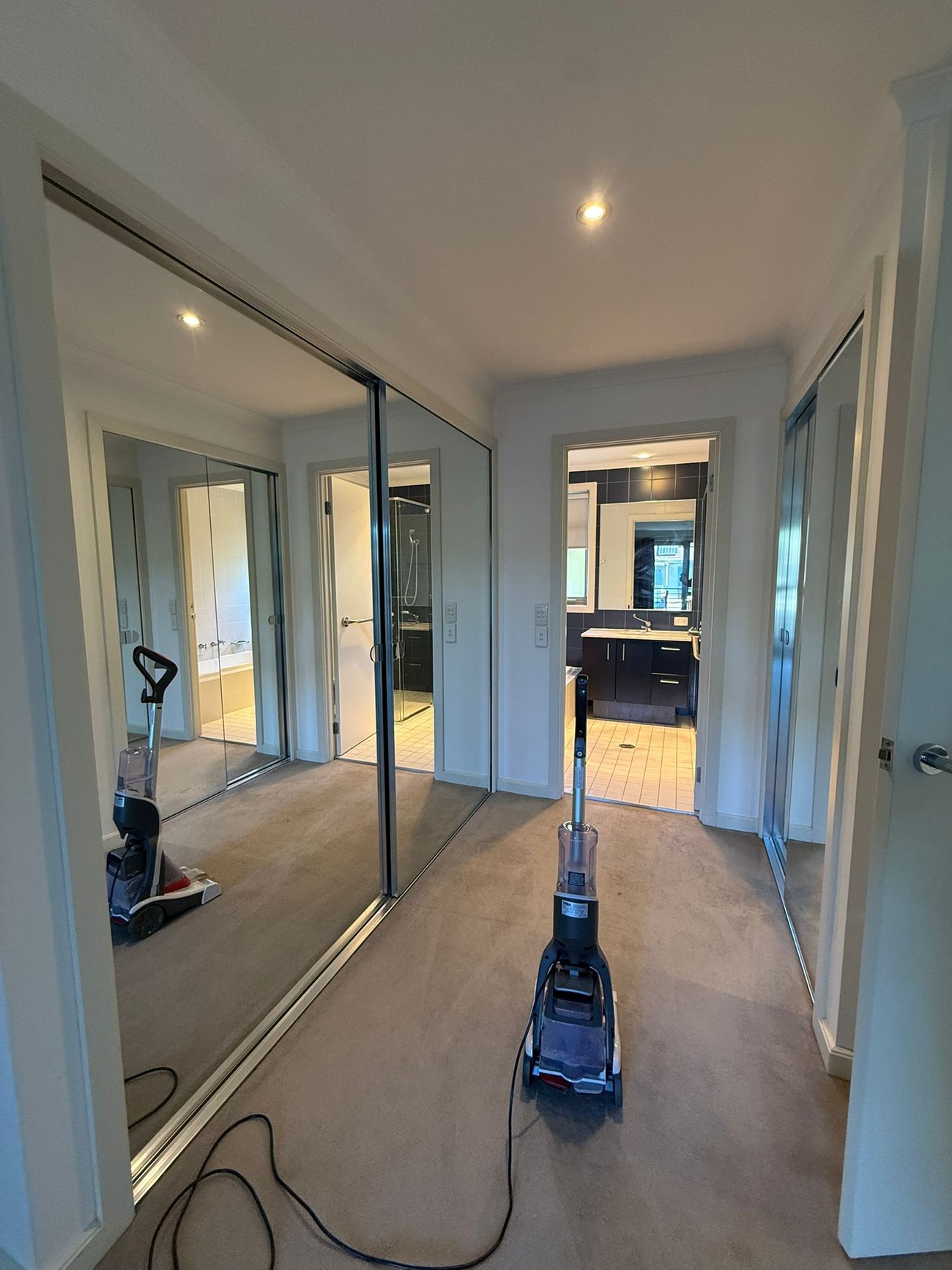 Carpet steam cleaning machine in a hallway during a job