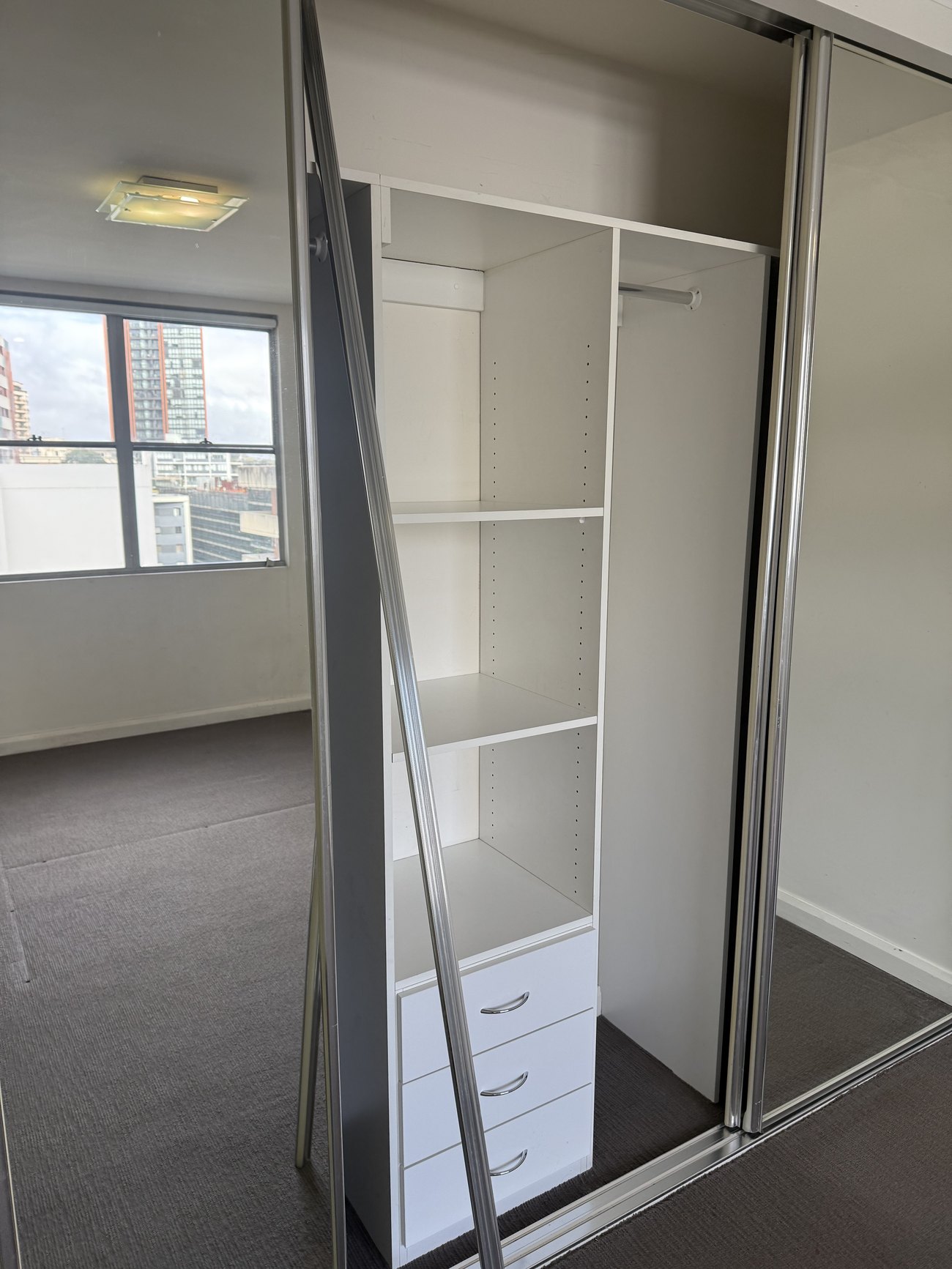 Open wardrobe shelving cleaned and reset